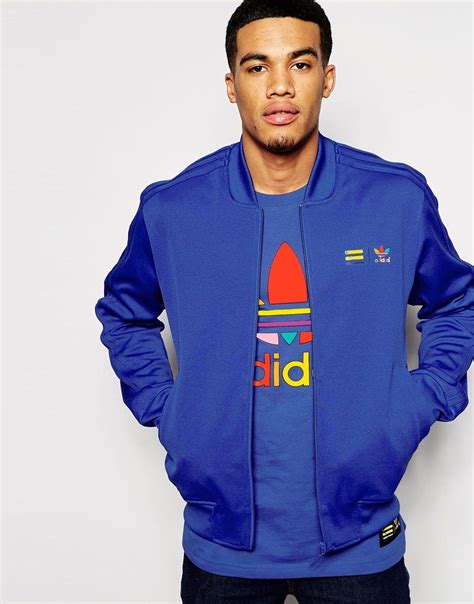campera adidas pharrell williams azul